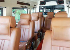 9 seater deluxe 1x1 tempo traveller